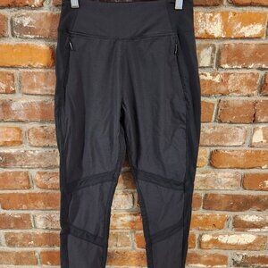 Athleta Black High Waisted Tummy Control Tapered Athletic Leggings. Size 4